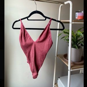 Urban outfitters pink body suit